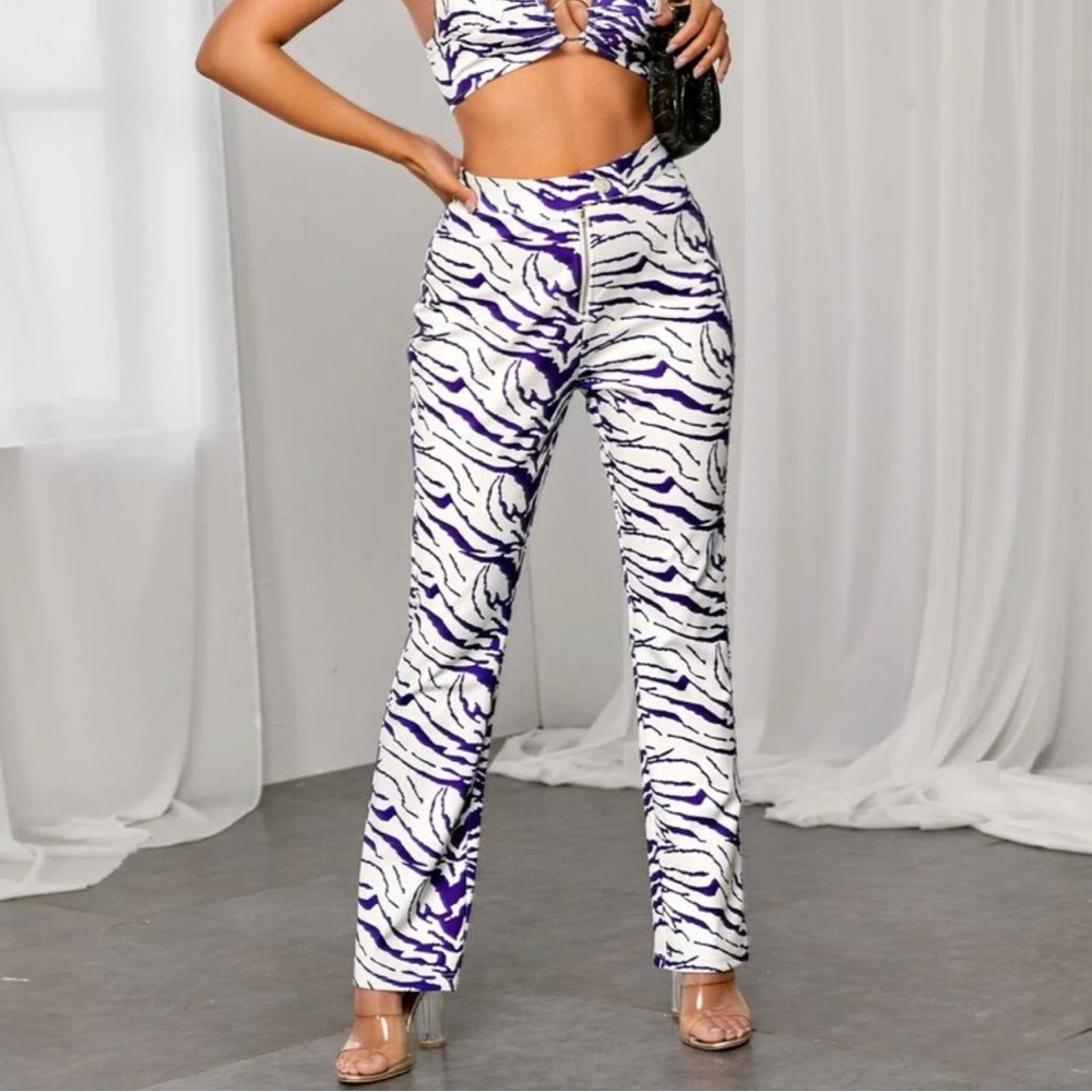 Purple and white zebra pants. Worn once for Halloween